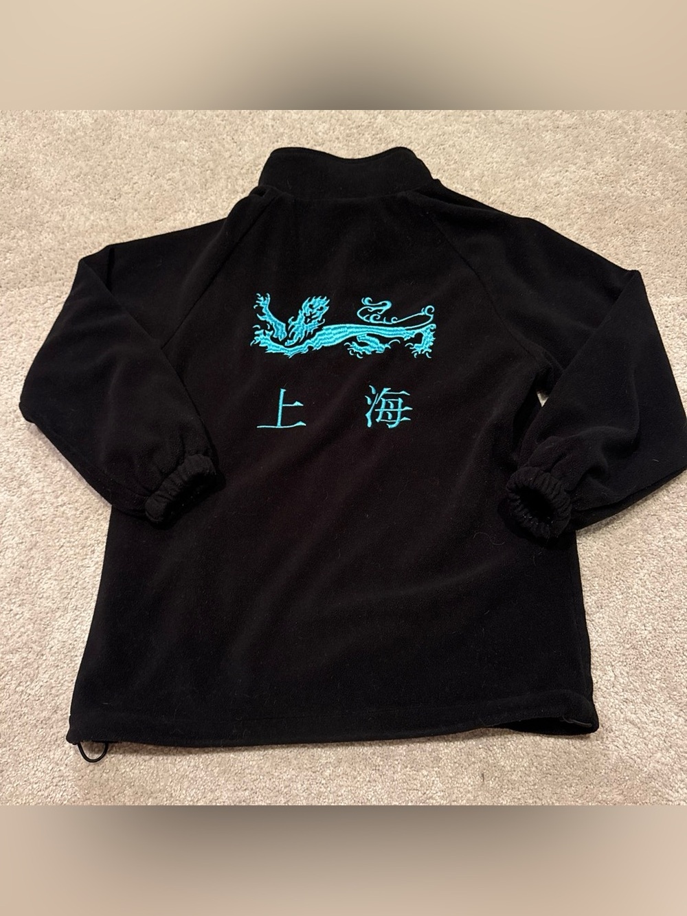 Black Fleece Jacket with Teal Accent